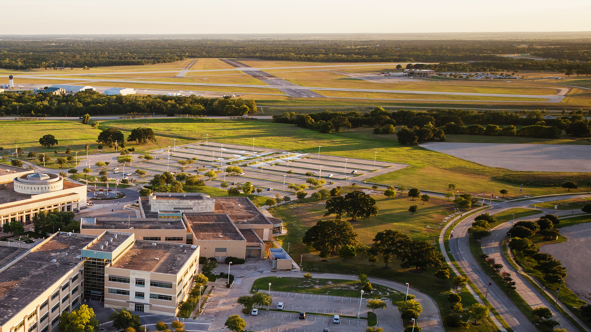 aerial view of airfield and neighboring buildings